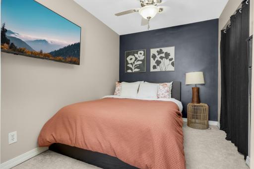 Sleep in style with darkness and French doors. Not shown in photo - laundry hook up! Toss & wash your clothes just two feet away.