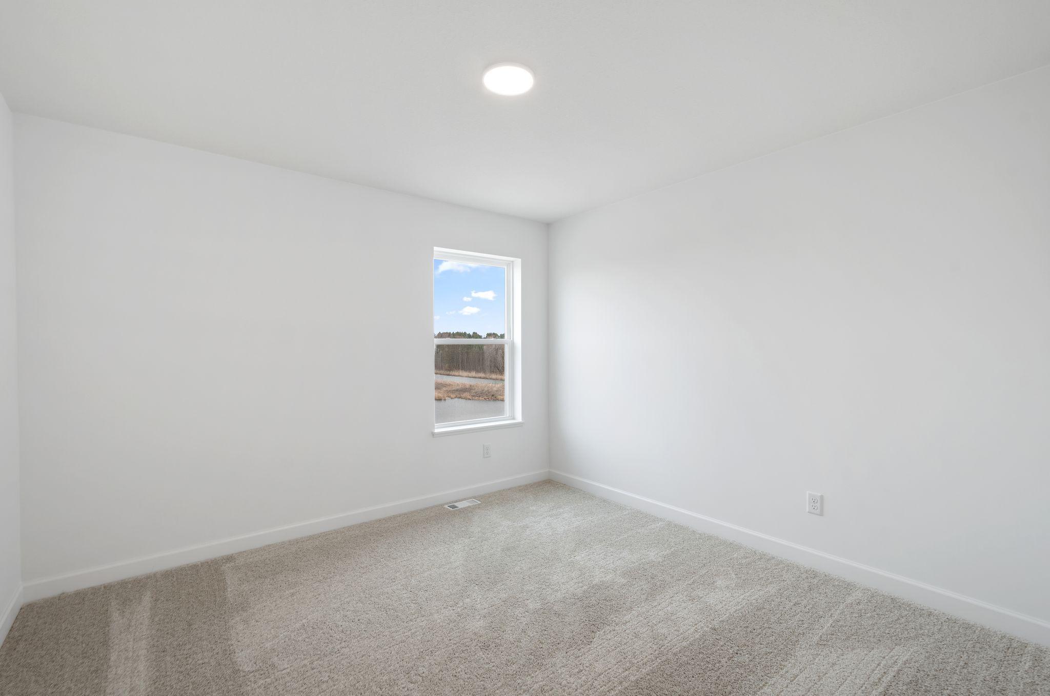 Secondary bedrooms offer a private refuge from the main living areas in the home.