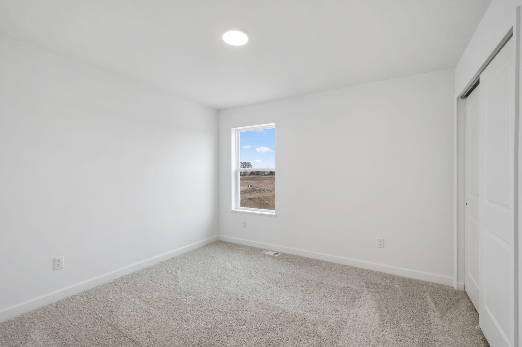 The home includes four bedrooms, ready to meet the needs of both large or growing families.