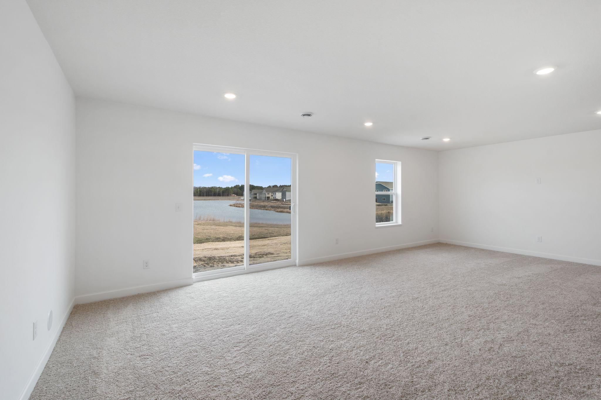 The finished basement offers enhanced versatility with an added recreation area, flex room, bathroom, laundry room and bedroom