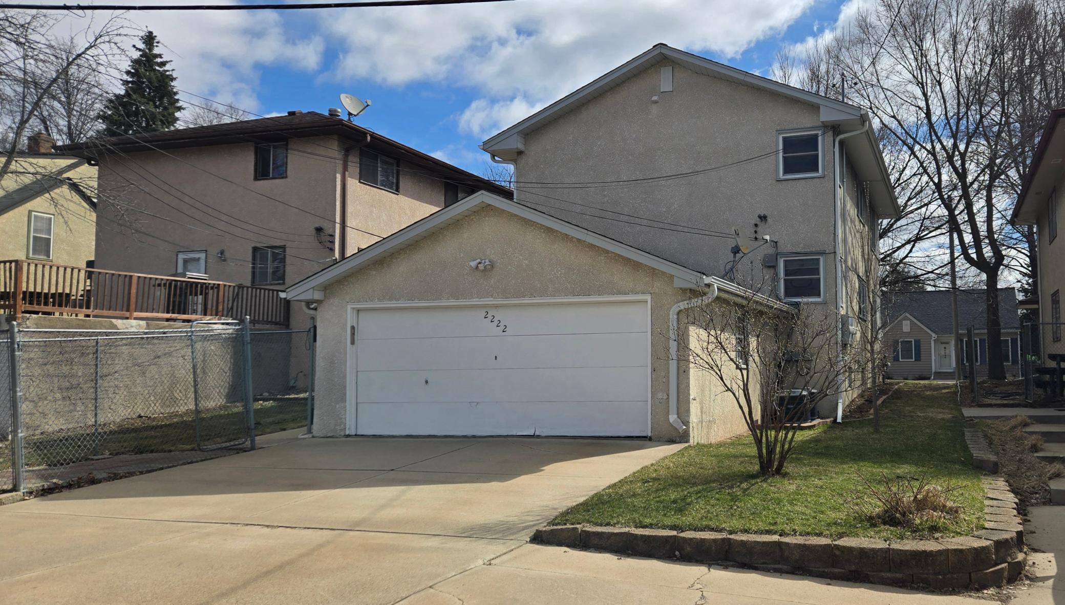 Two car garage, with parking for up to 6 cars on the driveway.