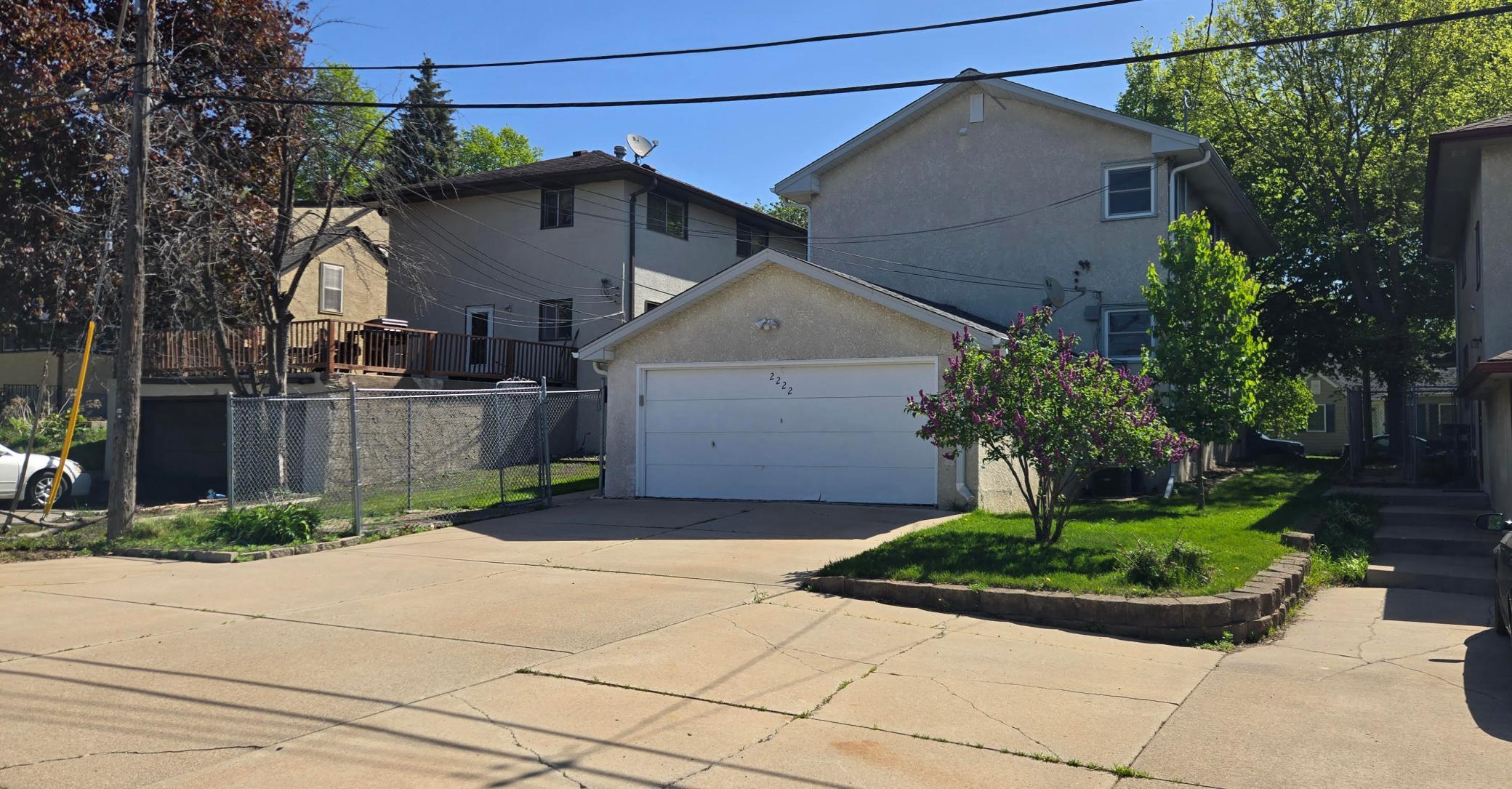 Two car garage, with parking for up to 6 cars on the driveway.