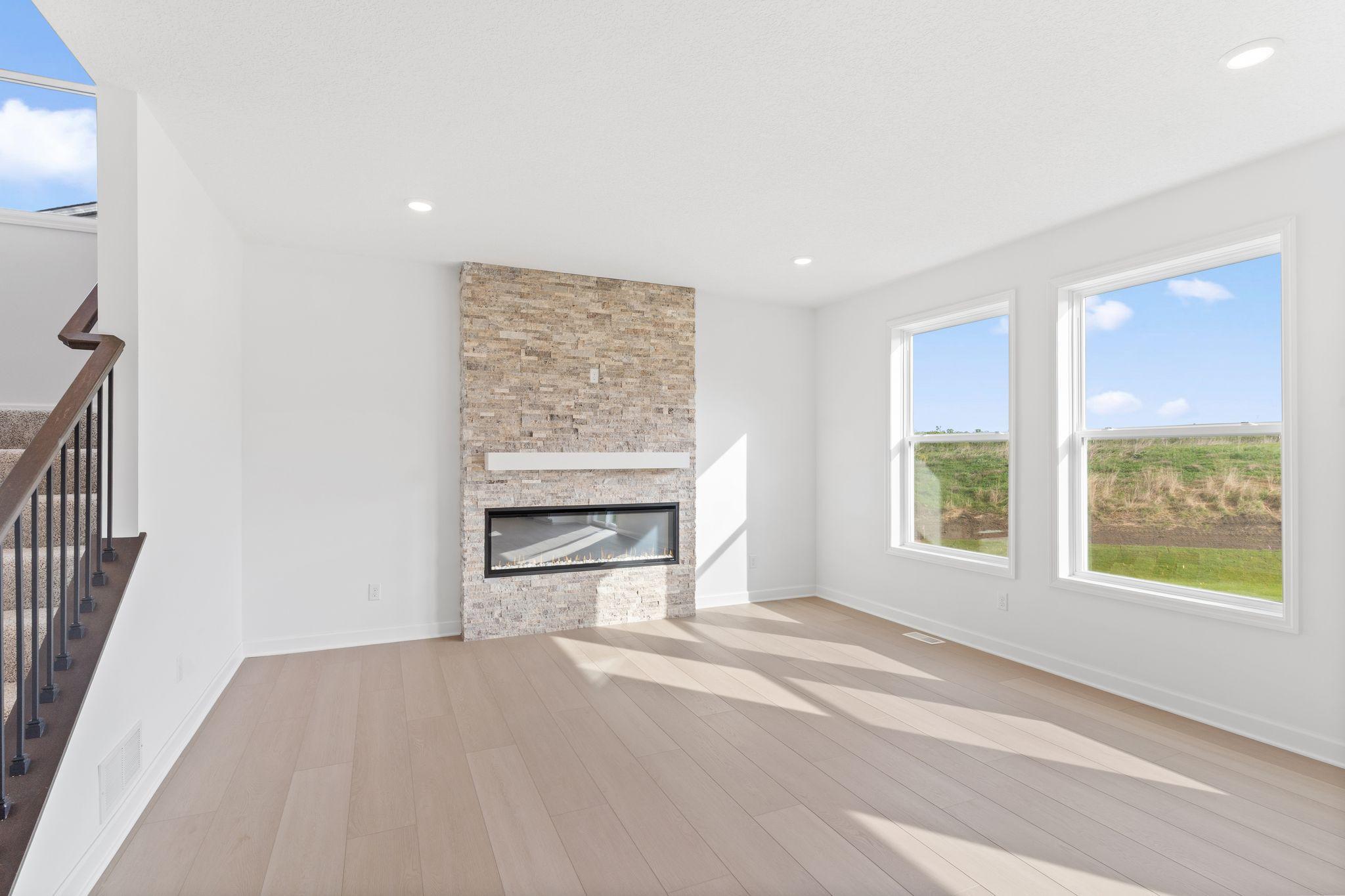 The Great Room provides a natural gathering space within the home for residents to rest and relax on the couch after a long day of play.