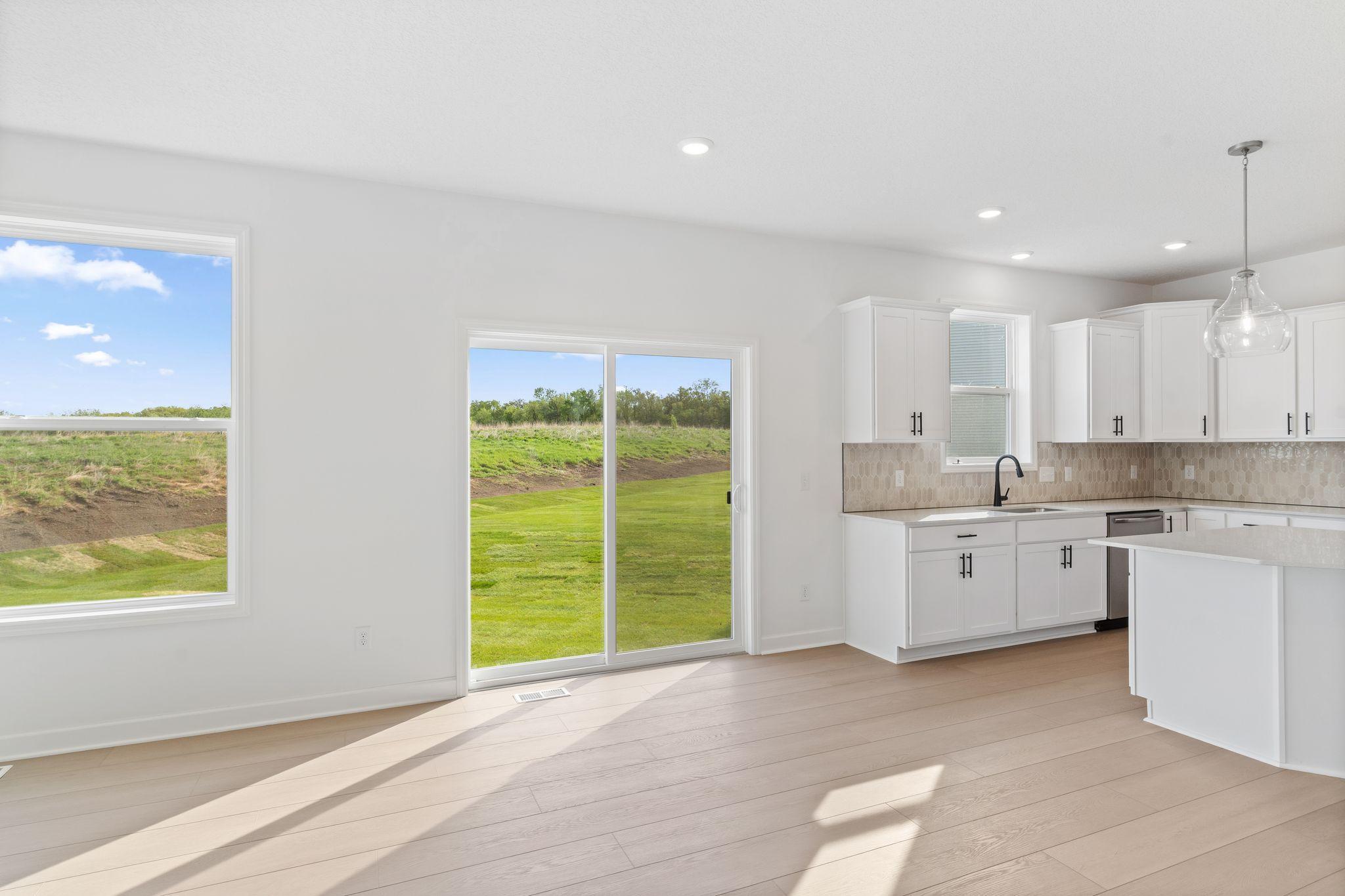 Enjoy meals of any kind in the dining room, situated among the open floorplan for effortless flow between cooking, dining and relaxing.