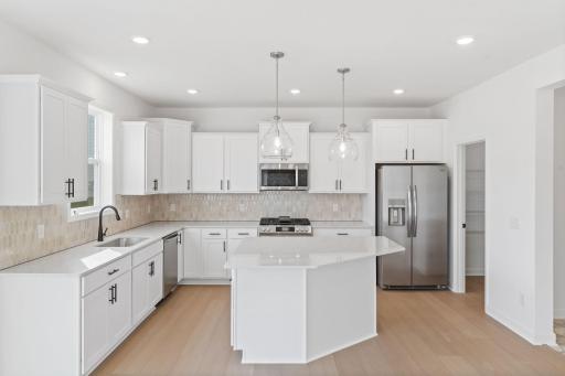 The kitchen naturally operates as the heart of this home, offering ample countertop space and brand-new appliances that will inspire attempts at new recipes.