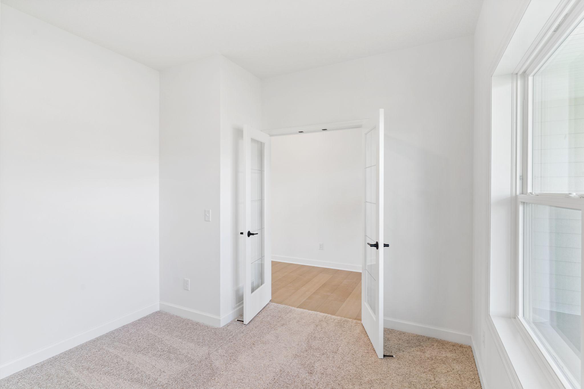 A first-floor office is situated just off the entry, ideal for working remotely or getting paperwork done.