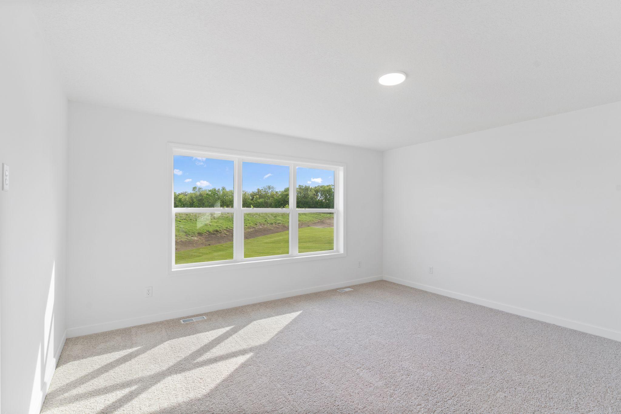 The owner’s suite is found on the second floor, complete with a cozy bedroom, an en-suite bathroom and a walk-in closet.