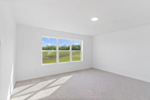 The ownerâs suite is found on the second floor, complete with a cozy bedroom, an en-suite bathroom and a walk-in closet.