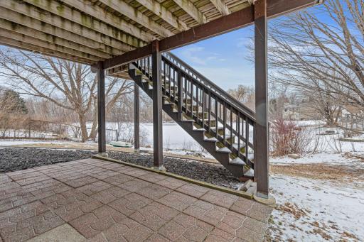 Walk-out lower level patio under the deck