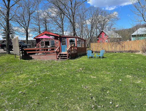 Lakeside Pic Of Cabin.png