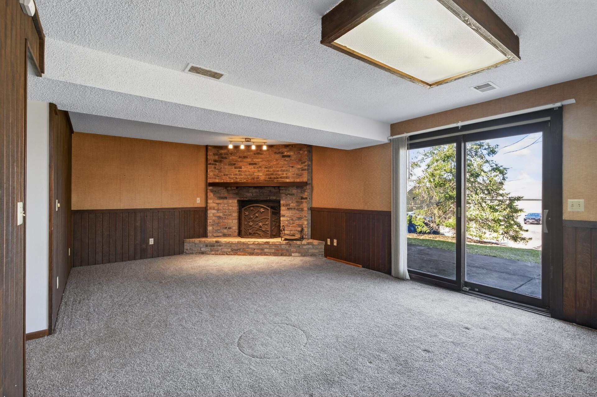 Enjoy cozy fires in your walkout lower level family room!