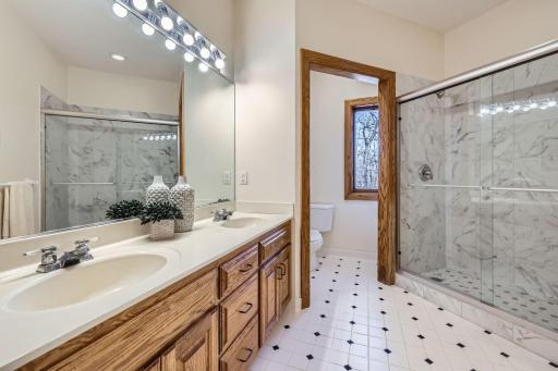 2nd Floor Bathroom with dual sinks and updated shower
