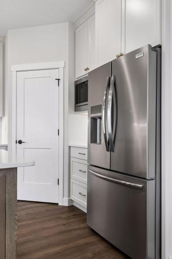 Generous corner pantry for all of your storage needs