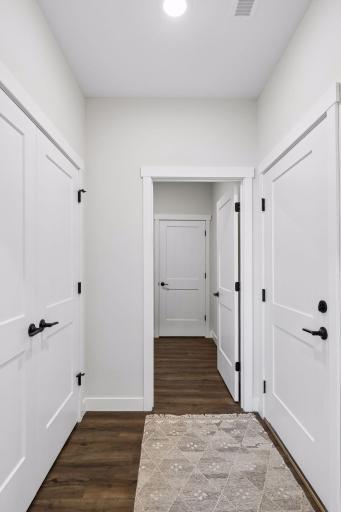 Mudroom with ample storage connects directly to the laundry room