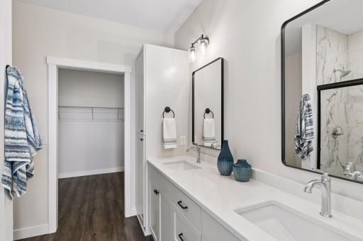 Private primary bath includes dual sink vanity