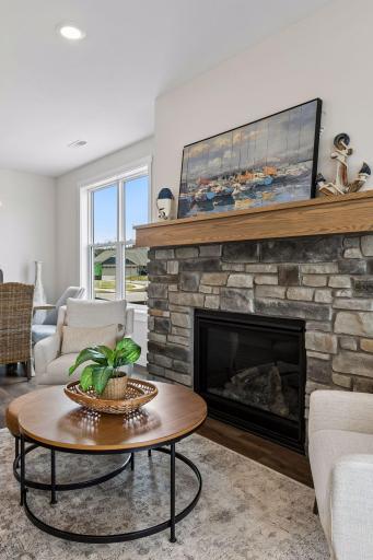Gorgeous stone gas fireplace set the tone for the space