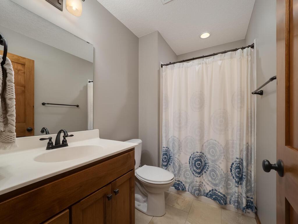 End of hallway bedroom w/ private bathroom