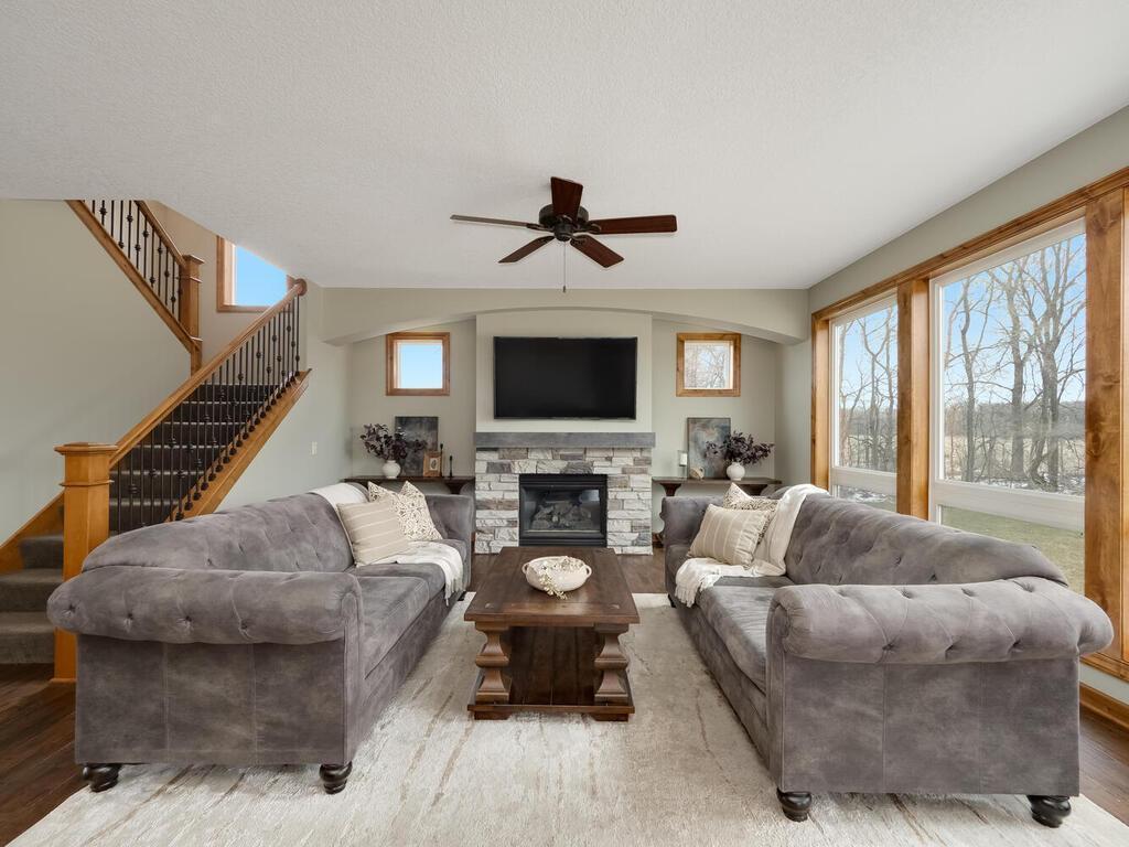 Living Room w/ stone surround fireplace