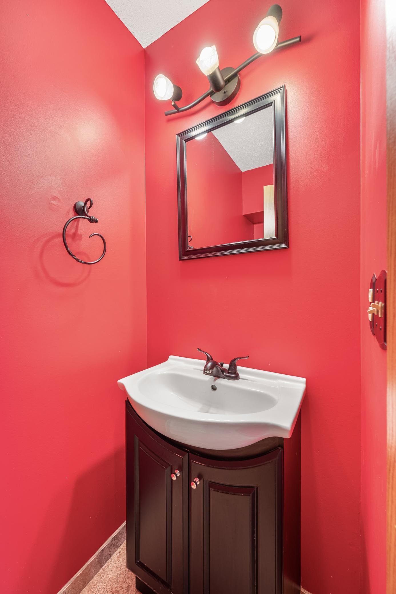 1/2 bath off of kitchen (1st Floor)