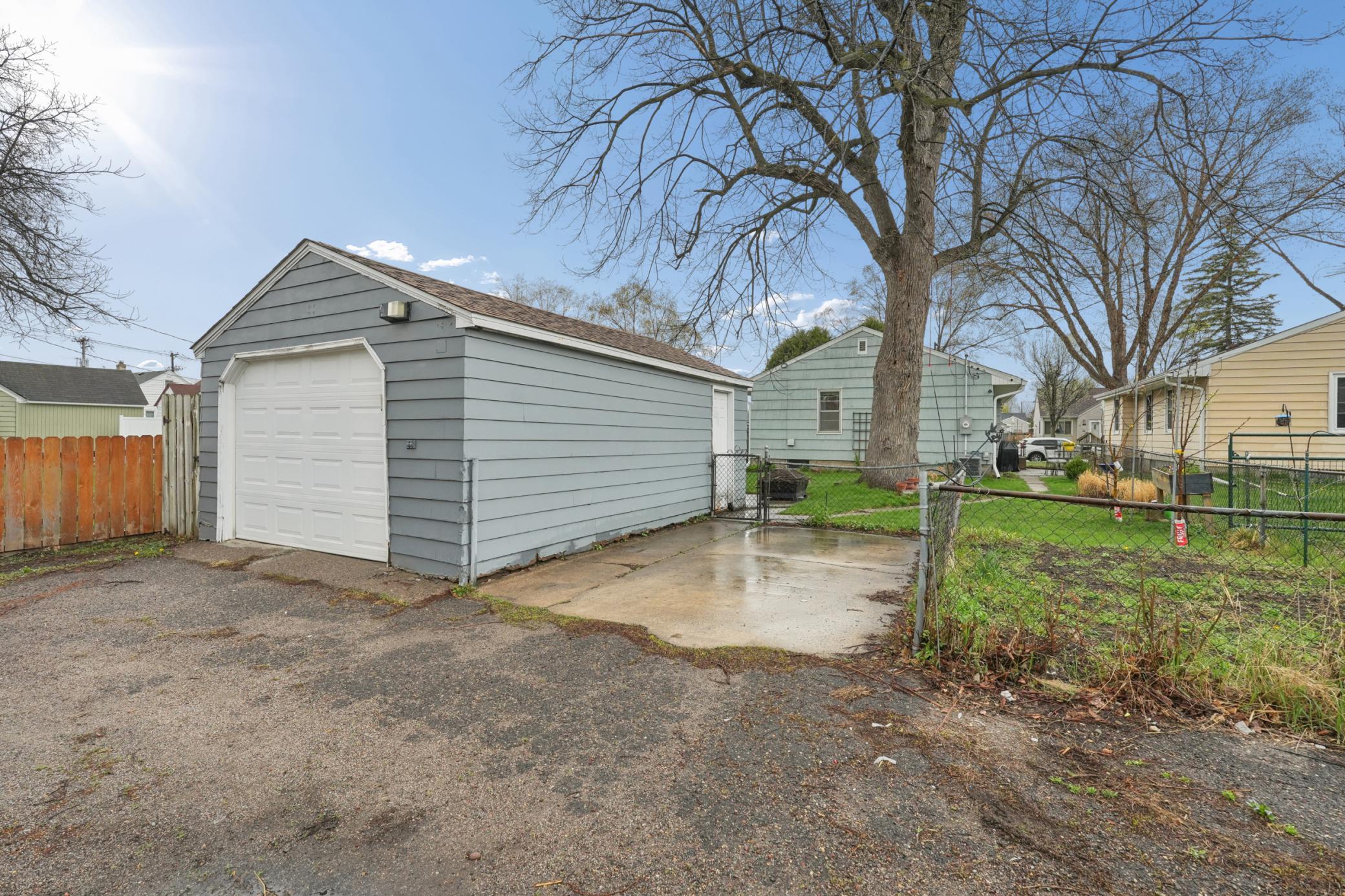 One car garage and an extra parking space. New garage door opener.