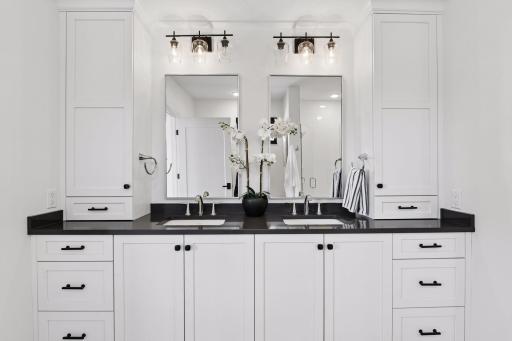 Double sinks and plenty of cabinet and counter space