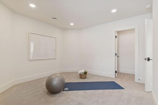 Lower level 6th bedroom or work out room.