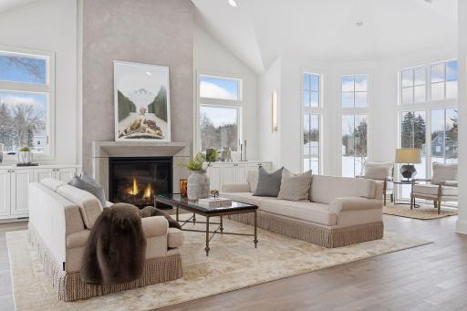 Vaulted ceilings and floor-to-ceiling windows.