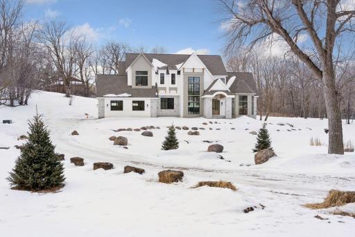 Tucked 400 feet off the road behind a peaceful pond and fountain.
