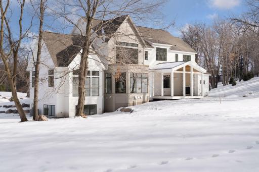 Built by Omni Custom Builders. The exterior of this home features a striking modern-traditional design with clean lines and elegant detailing.