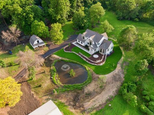 Built by Omni Custom Builders. The exterior of this home features a striking modern-traditional design with clean lines and elegant detailing.