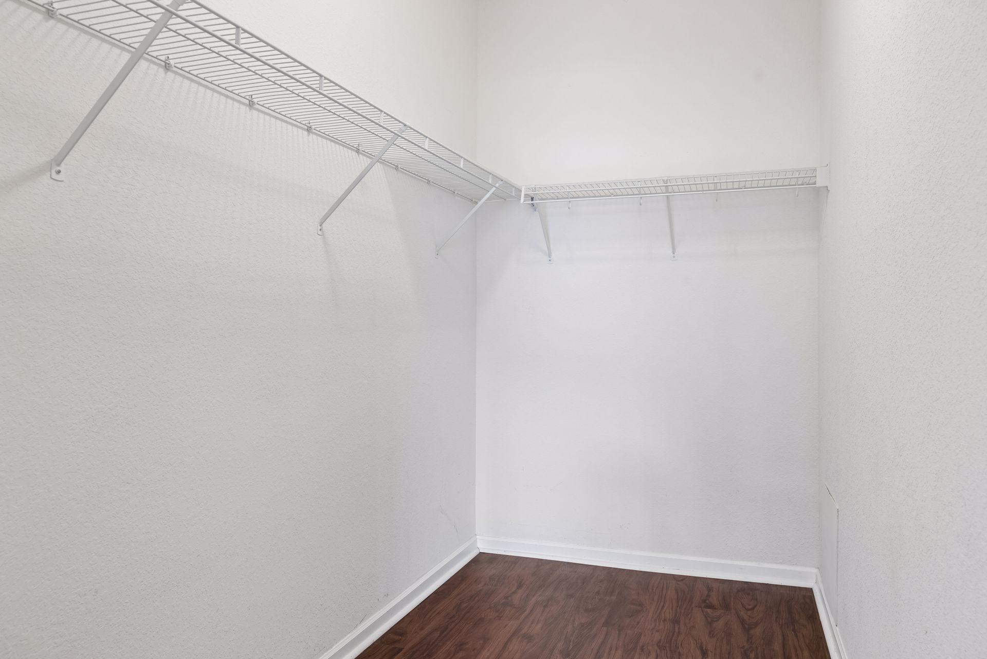 Large primary walk-in closet.