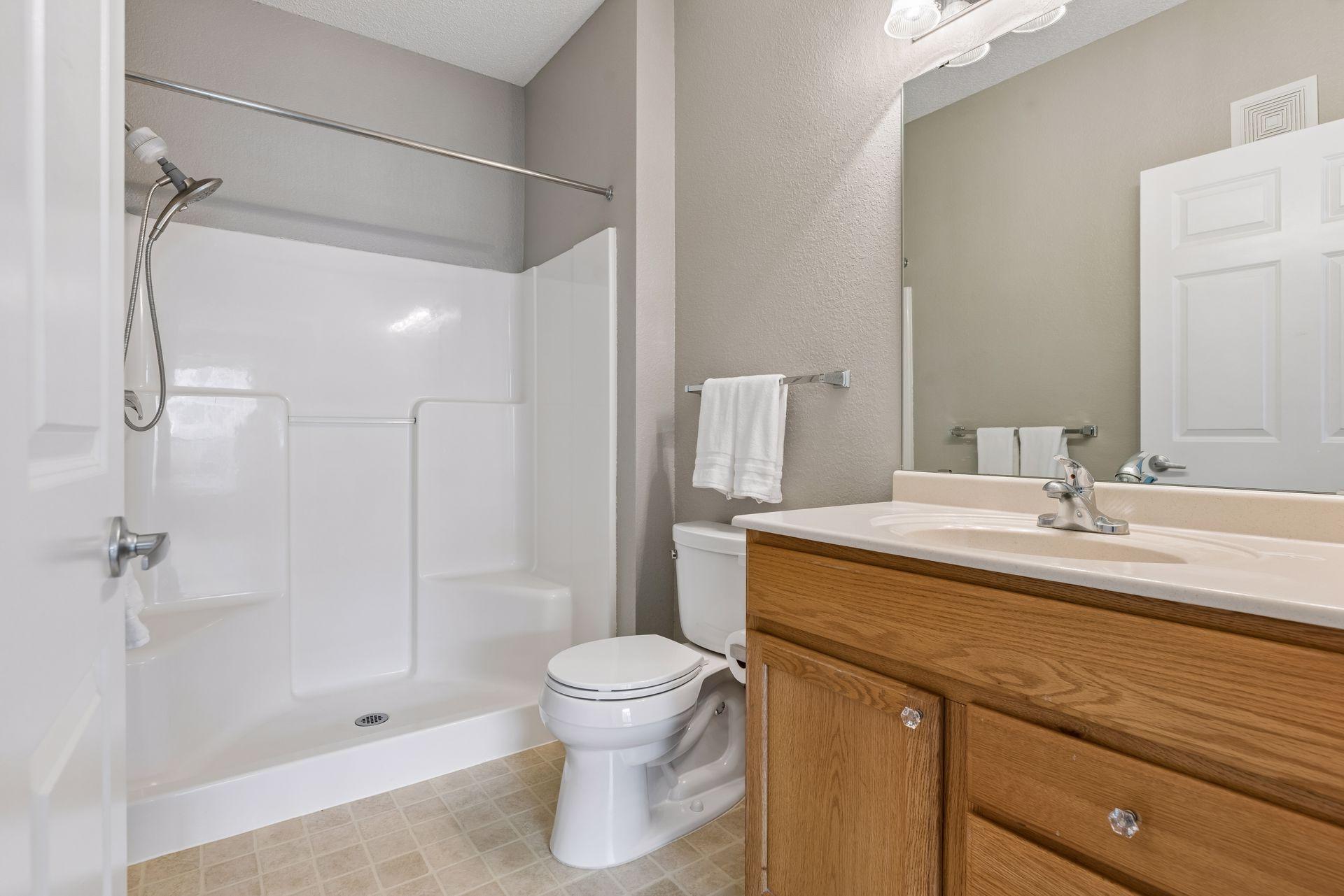 Primary 3/4 bath with easy accessibility.