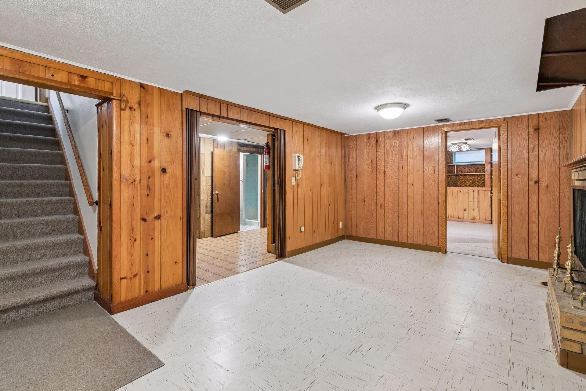 Plenty of space with access to the den, laundry/mechanicals and lower level bath.