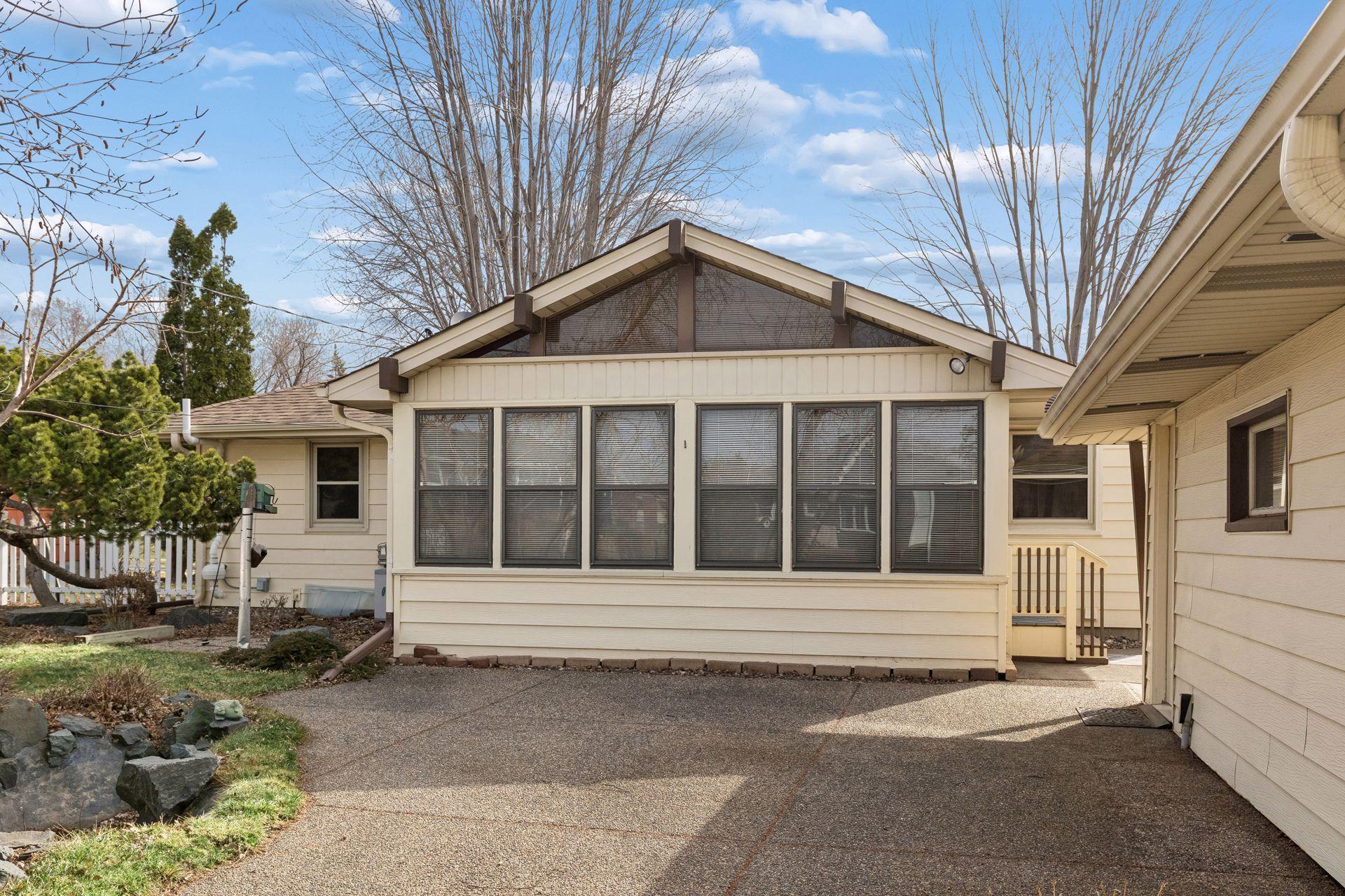 Step onto this inviting patio, perfect for barbecues, outdoor meals, and entertaining!