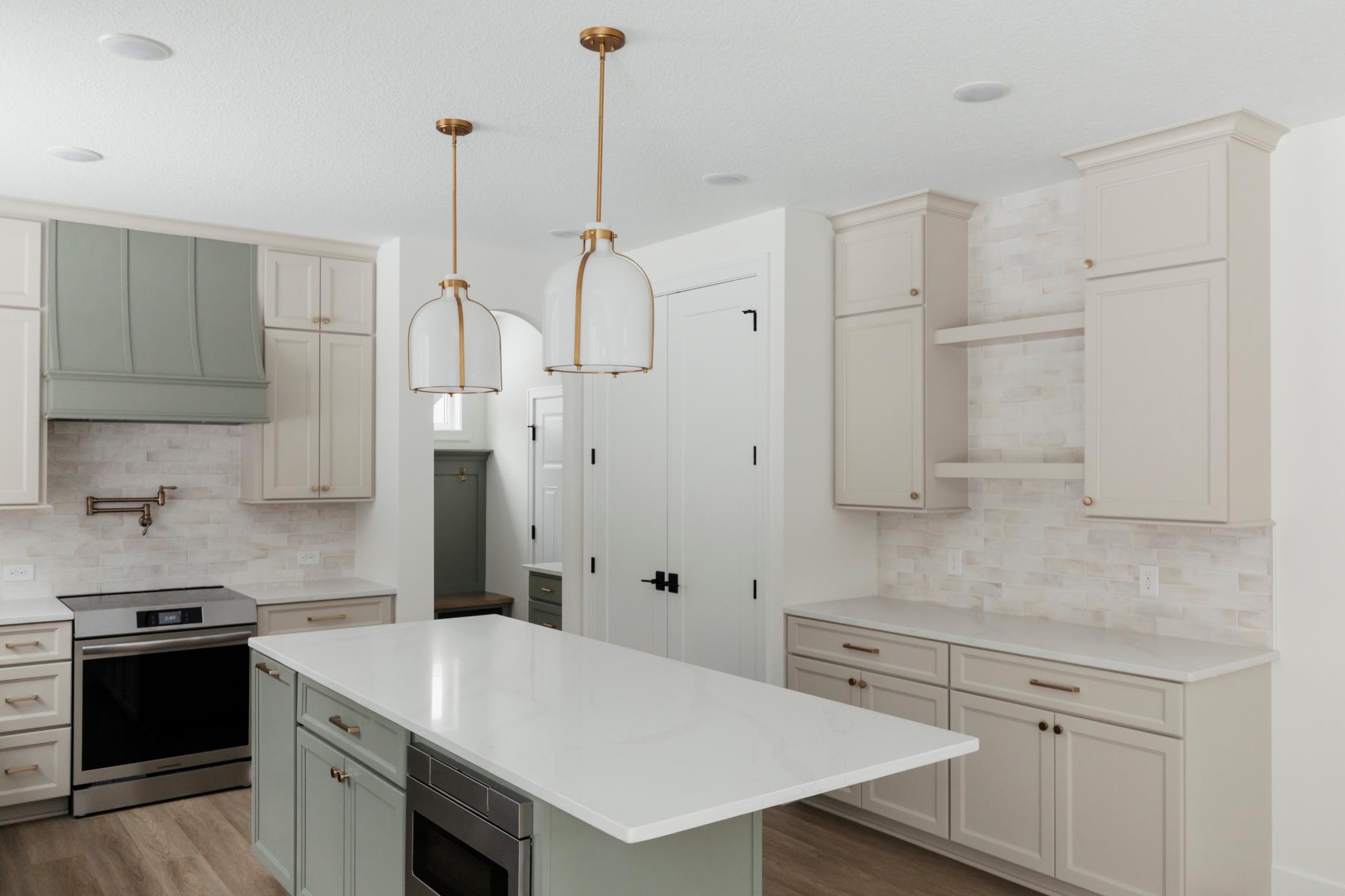 Upgraded cabinets with crown moulding! Tons of kitchen storage! *Photos are from a prior model-Majority of shown options are included in the sales price.