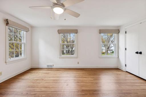 Bedroom #3 - hardwood flooring, flooded with light