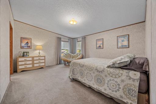 Primary Bedroom w/ walk-in closet and Hollywood bath