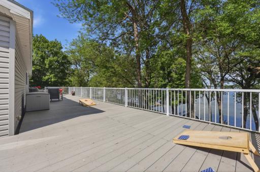 Lakeside Maintenance Free Deck runs the full length of the home.