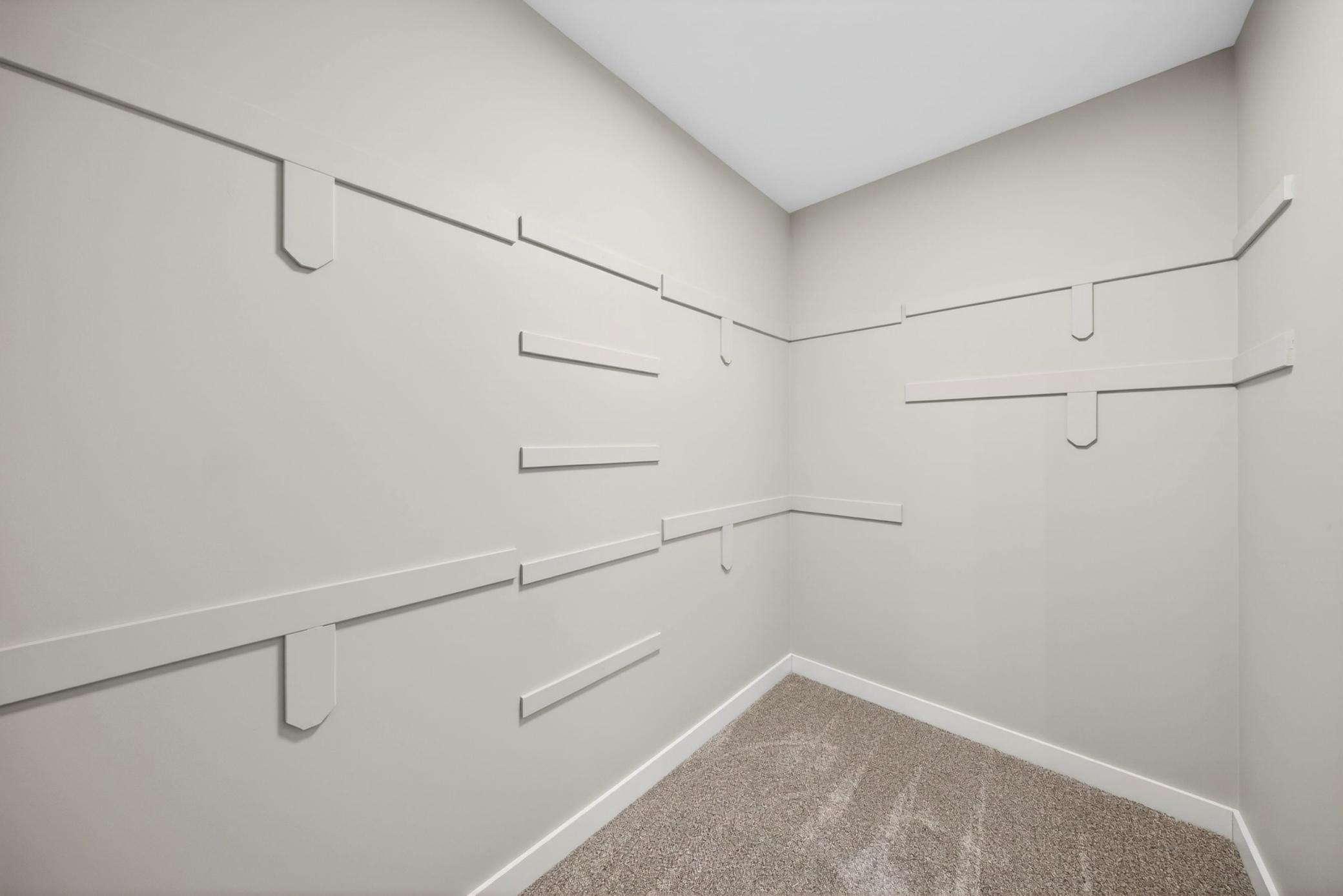 022 - Main Floor Primary Walk in Closet.jpg