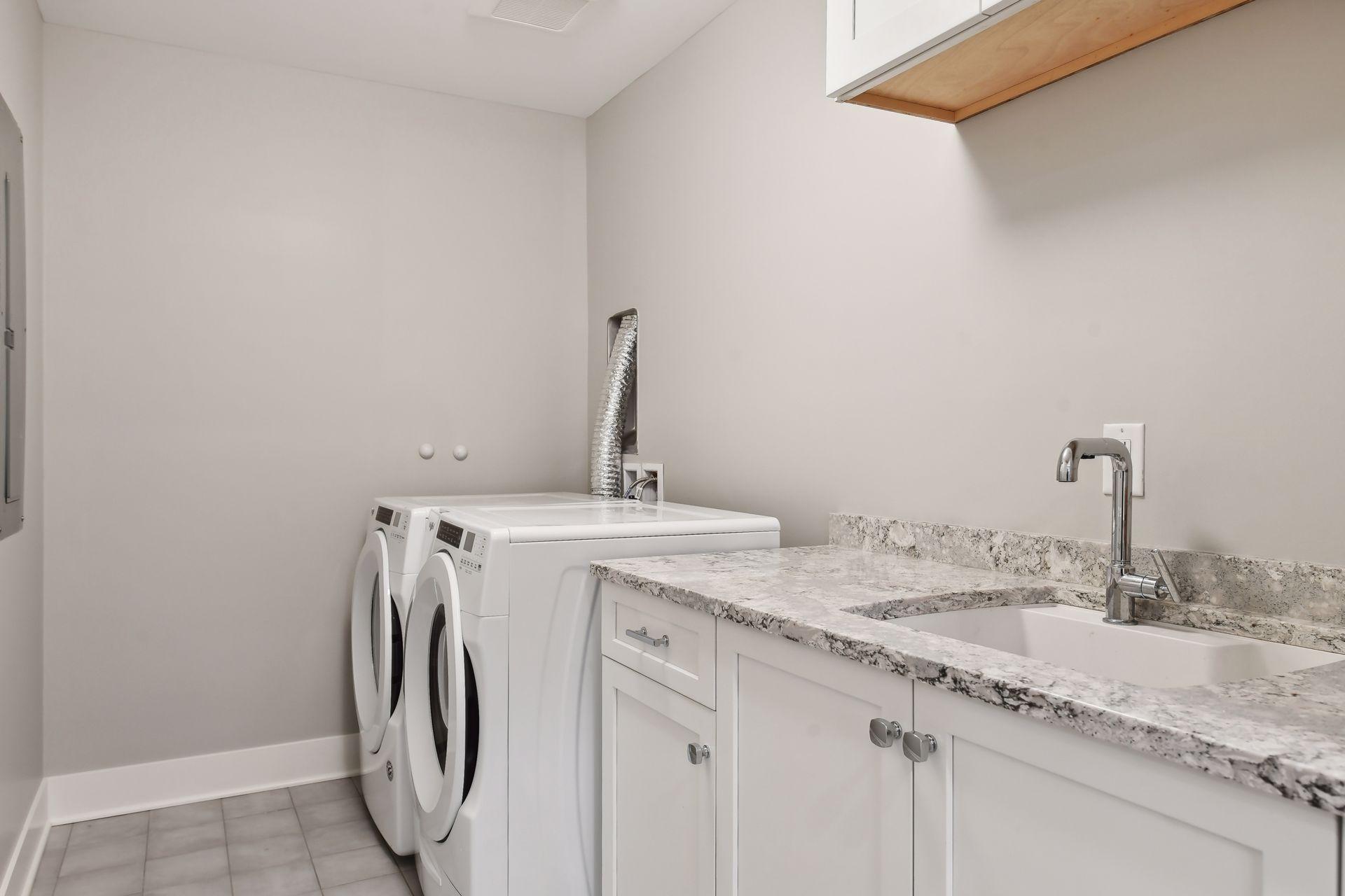In-unit washer and dryer with ample space in the laundry room