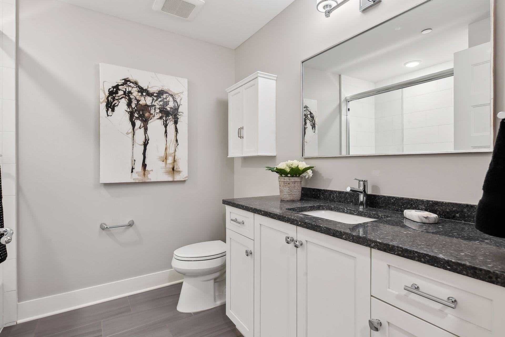 Secondary bath is a full with tub/shower combo