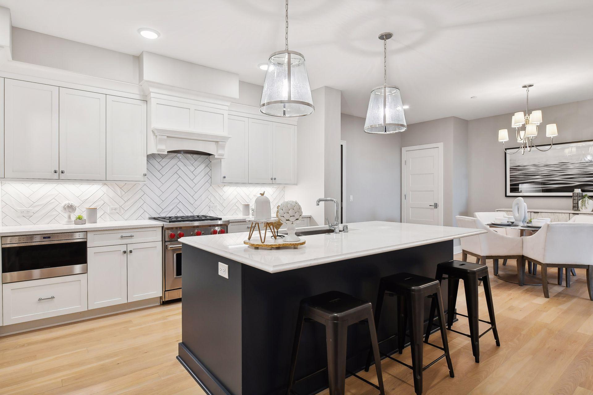 Kitchen has Cambria countertops, lots of counter space, and a great spot to meal prep