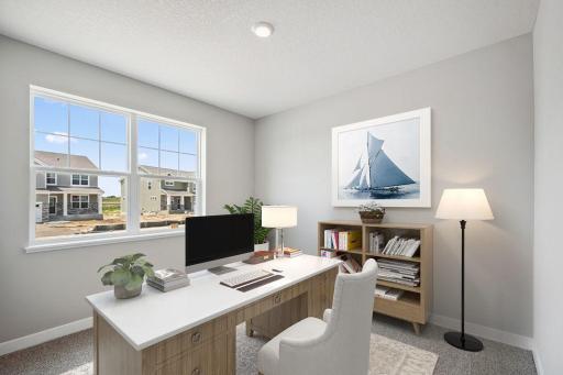 Virtually staged as an office, this could be a guest bedroom, sitting area, or whatever your household needs! Spec home, colors and finishes will vary.