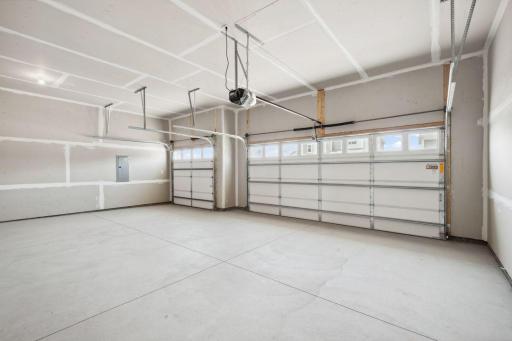 3-car garage provides opportunities for workspace, storage and toys! Spec home, colors and finishes will vary.