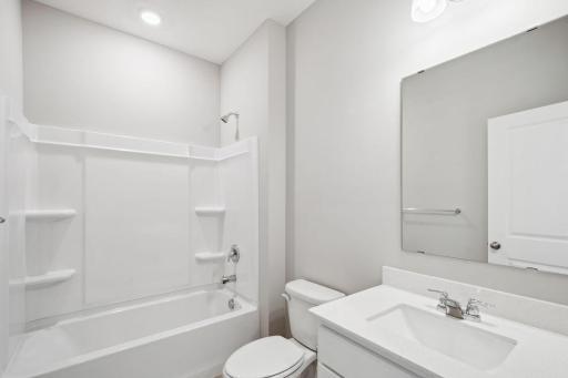 Guest bath. Spec home, colors and finishes will vary.