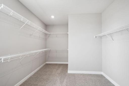 Extra-large walk-in closet in the primary bedroom! Spec home, colors and finishes will vary.