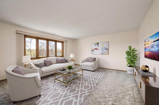Enjoy private park views through the large living room windows, radiating the home with natural light from its desirable southwest exposure