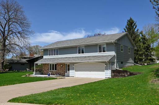 Welcome home to this very well maintained walkout rambler, perfectly situated directly across from Northwoods Park