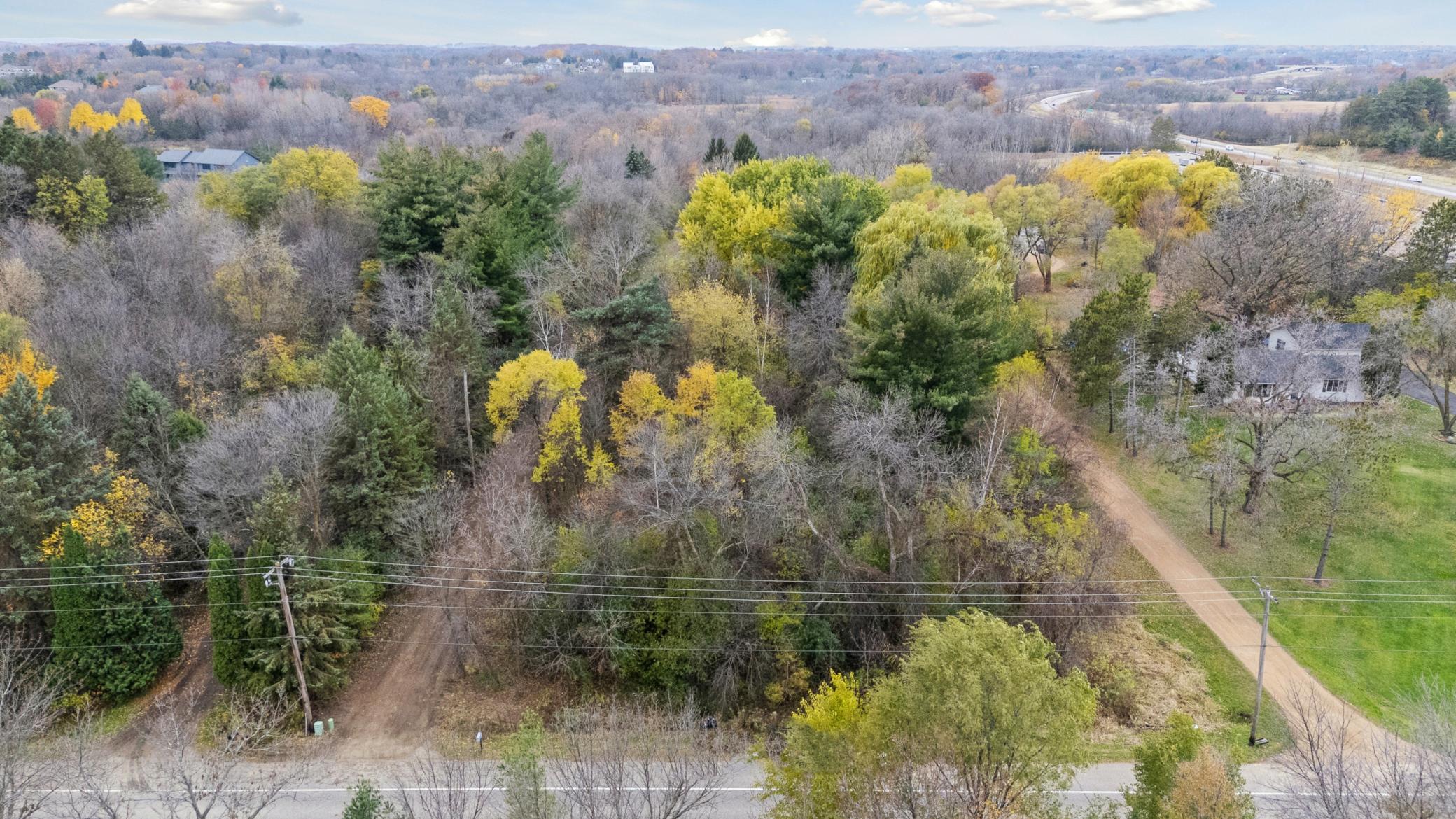 Backs Up to Wooded City Land