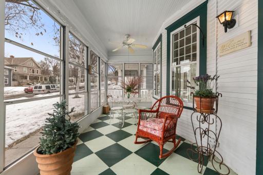 The three season porch spans the front of the home
